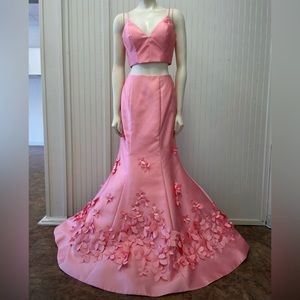 Sherri Hill Style 52580: Coral Two-Piece Mermaid with 3D flowers on the bottom.